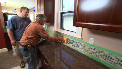 Adhesive Backsplash Tiles on Helps A Homeowner Install A Tile Backsplash In His Kitchen