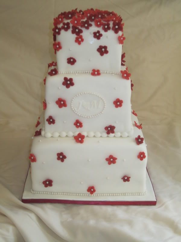 Wedding shower cake,red fondant flowers,orange fondant flowers,flower cake