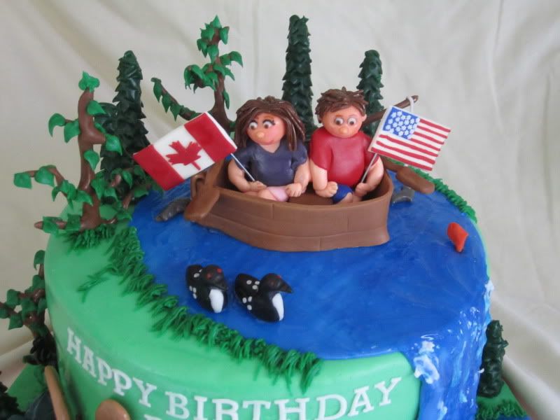 wild life cake,fondant beavers,fondant moose,fondant boat,fondant loons,fondant trees,fondant waterfall